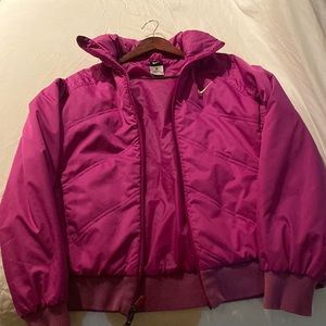 Women’s sport jacket with zipper with hidden hood with zipper.